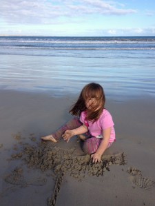Matilda playing on the beach